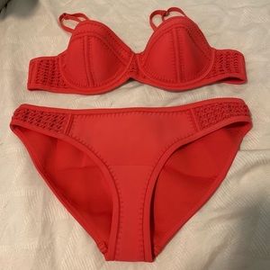 Three pre-owned authentic Triangl swimsuits